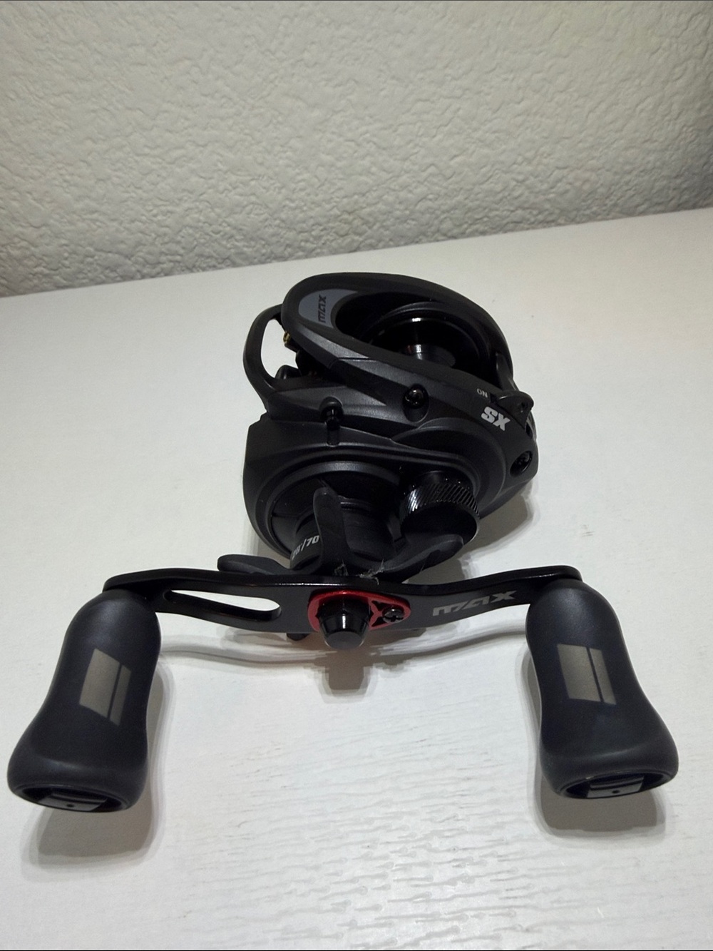 Abu Garcia Max SX Black Low-Profile Baitcasting Reel with Dual Ergonomic Handles